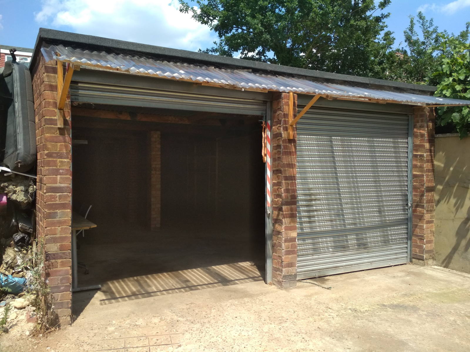 garage with one door open