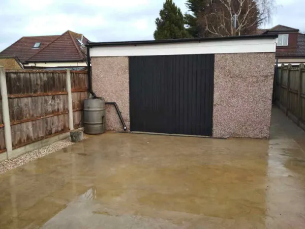 Garage from back yard with doors closed
